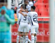 Jugadores de Liga de Quito celebran el gol de Lisandro Alzugaray