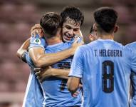 Jugadores de Uruguay, celebrando la goleada.