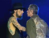 Captura de pantalla de la pelea entre la banda Jane's Addiction sobre los escenarios de un show en Boston.