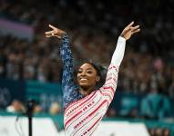 US' Simone Biles competes in the balance beam event of the artistic gymnastics women's team final during the Paris 2024 Olympic Games at the Bercy Arena in Paris, on July 30, 2024. (Photo by Gabriel BOUYS / AFP)