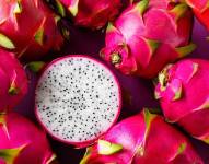 White Dragon Fruit on an old wooden table.