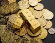 Lingotes y monedas de oro
