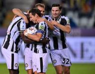 Jugadores del Udinese, celebrando su gol.