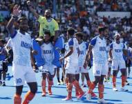 El equipo de la India celebra la victoria ante España en el partido masculino de hockey por el bronce.