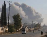 Los combatientes ingresan a los distritos de Rashidin en las afueras de Alepo, Siria, el viernes.