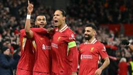 Jugadores del Liverpool, celebrando el triunfo.