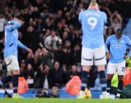 Jugadores del Manchester City lamentando la derrota.