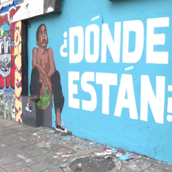 Un mural en las calles Loja y Rocafuerte, centro de Guayaquil, con la leyenda ¿Dónde están? con la imagen de uno de los cuatro niños desaparecidos en el sur de Guayaquil, el pasado 8 de diciembre.