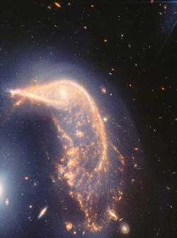 Imagen de las galaxias NGC 2936 y NGC 2937 uniéndose.